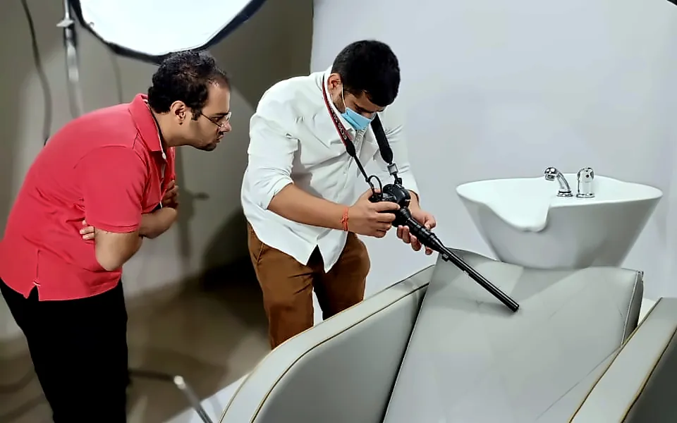 Ad film shoot with probe lens on a salon chair product by Bintin Media, Delhi