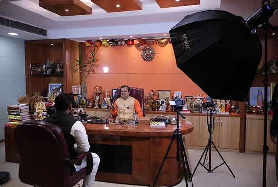Behind the scenes of an on-location video podcast shoot with professional lighting by Bintin Media