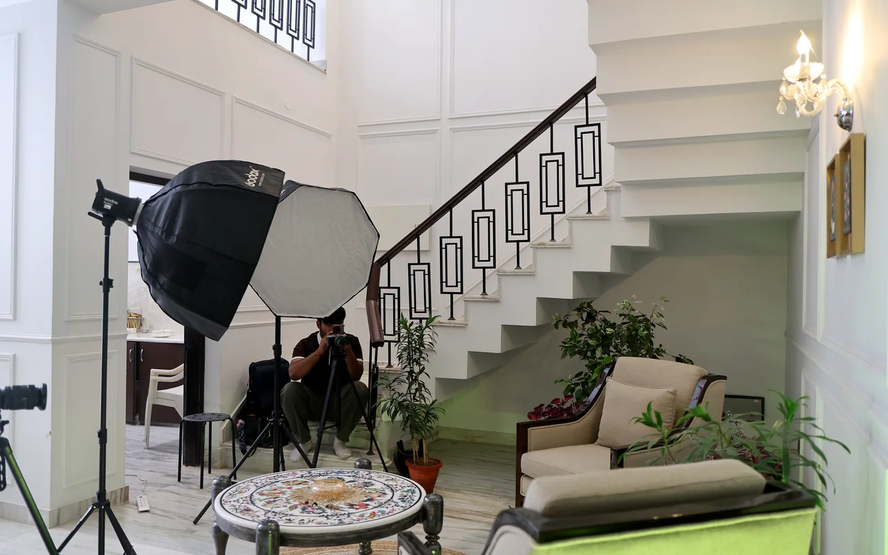 Portable interview setup with softboxes and cameras in a South Delhi home, by Bintin Media