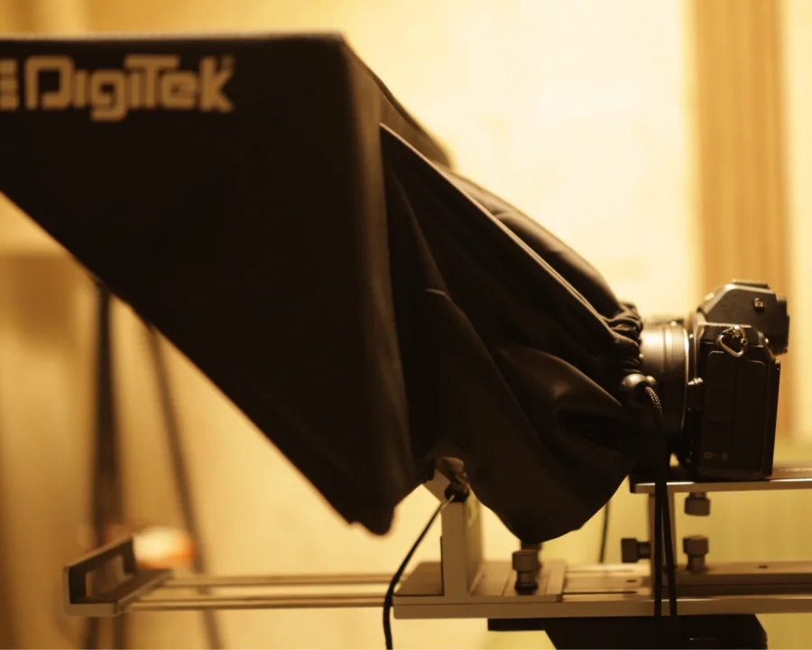 Teleprompter + mirrorless camera setup at the Bintin Media podcast studio in Dwarka, Delhi