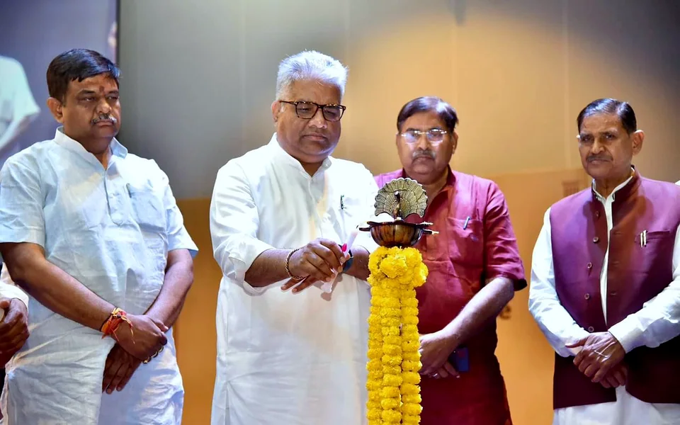 Leaders lighting the ceremonial lamp at a public office event covered by Bintin Media